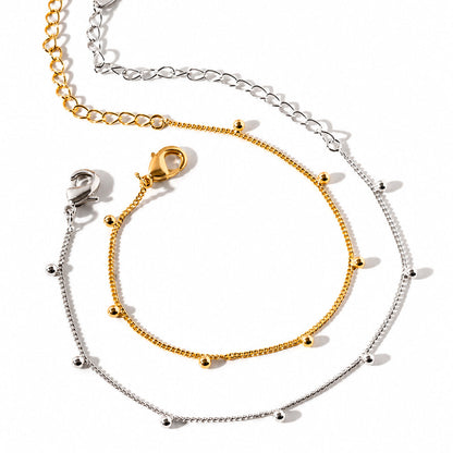 PULSEIRA BOLINHAS LISAS EM RÓDIO 15CM