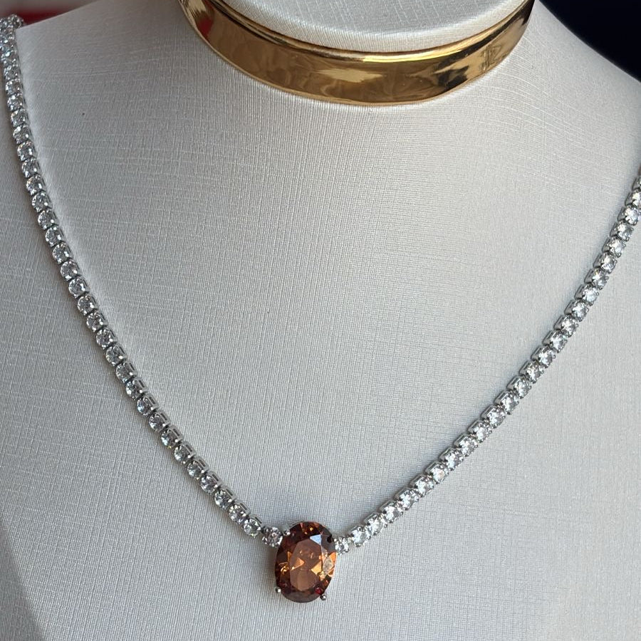 RIVIERA COM PEDRA OVAL CENTRAL