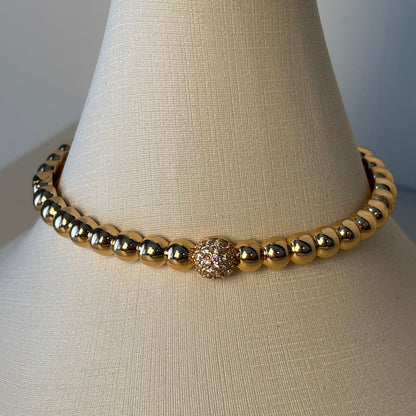 BRACELETE DE BOLINHAS COM CENTRO CRAVEJADO DE ZIRCÔNIAS