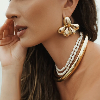 BRINCO GOSTAS LISO BANHEO EM OURO 18K