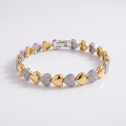 PULSEIRA CORAÇÕES COM DETALHES CRAVEJADOS E MIX DE BANHOS